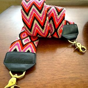 Woven guitar purse strap, with black leather + brass.